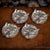 Novelty set of four solid silver fox head dishes, realistically cast as a fox heads with ears pricked and chased fur....