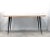 This dining table is made of DM with a white glass top. The iron legs are lacquered in black with golden brass leg...