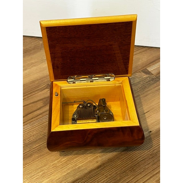 This is a vintage Italian wood-inlaid floral marquetry music or jewelry box, crafted in Sorrento, Italy, featuring a...