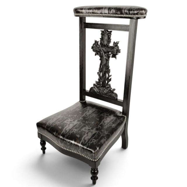 An exceptional French Gothic Revival prie-dieu (prayer chair), circa 1900. This piece features a striking dark black...