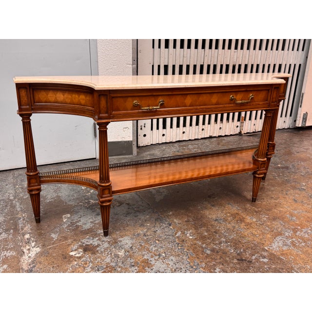 Design Plus Gallery presents a Vintage Marble Console Table from Weiman. This console has a gracefully contoured marble...