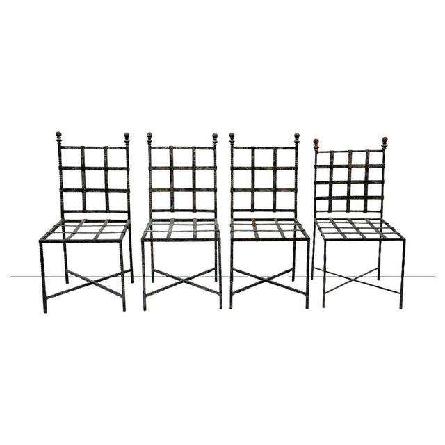 Set of 4 chairs, 1950s, made in italy. Unique pieces: set of 4 very heavy heavy wrought iron outdoor chairs with elegant...