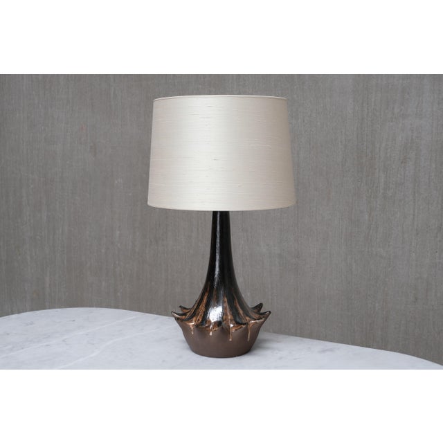 This rare and generously sized table lamp was designed and produced by niels preben larsen in his own workshop at...