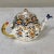 19th Century French Faience 8 piece Hand-Painted Tea Service represents the remarkably unique and definitively French...