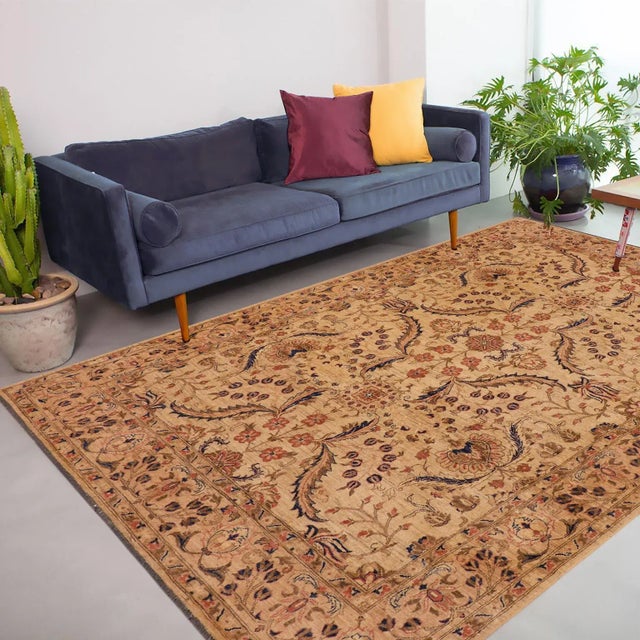 "Enhance the ambiance of your home with this magnificent Persian-influenced Turkish hand-knotted rug made by skilled...