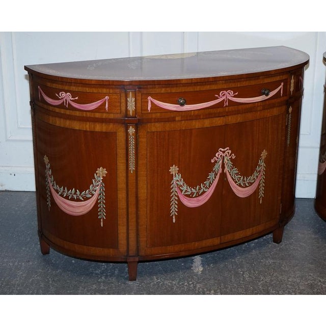Pair of Hand Painted Demi Lune Sheraton Style Console Cabinets A fine and substantial pair of hand painted demi lune...