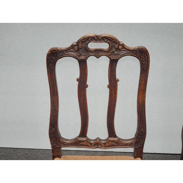 1930s Pair of Antique French Provincial Style Ornate Carved Rush Seat Side Chairs For Sale - Image 5 of 17