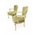 An elegant pair of lacquered and gilded wooden armchairs, crafted in the first half of the 20th century in the refined...