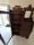 This antique American "Side-by-Side" secretary desk and curio cabinet dates from the late Victorian to early Edwardian era...