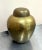 1940s-50s asian brass ginger jar. Some patina to metal throughout, including heavy patina to inside of lid as shown.