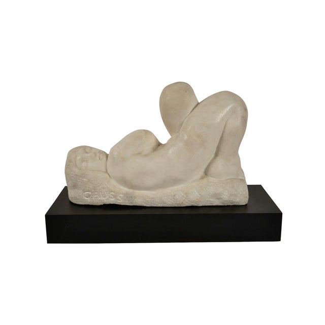 This is a beautifully sculpted marble nude, signed and dated 1978 by noted Sculptor Eugene Gauss. The reclining nude is...