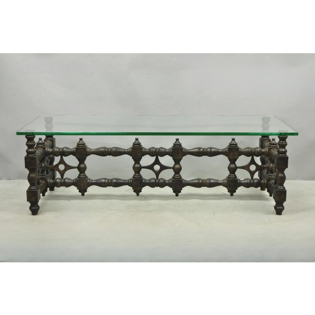 Vintage Gothic Renaissance Style Turn Carved Wooden Fretwork Rectangular Thick Glass Top Coffee Table. Circa Mid 20th...