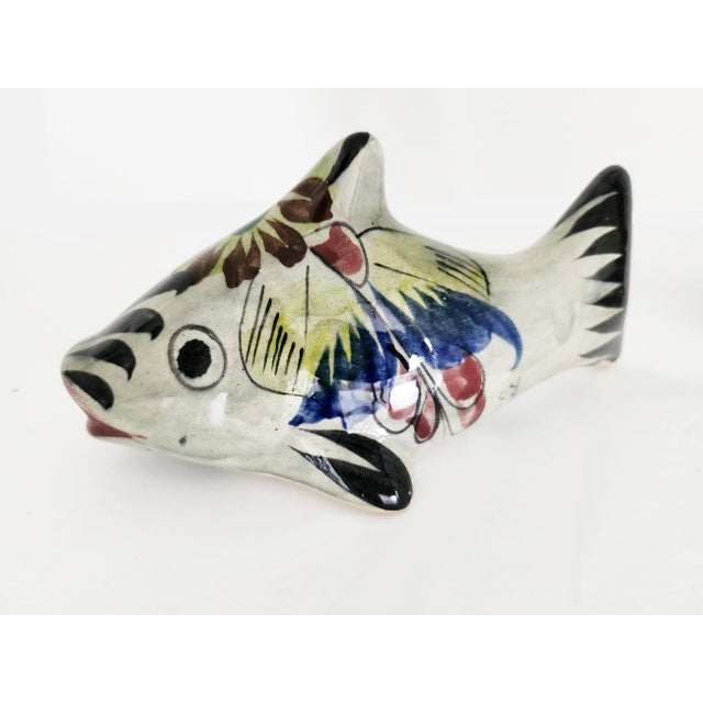 Offered is a vintage 1970s burnished ceramic fish figurine from Tonalá in Jalisco, Mexico and created by Ken Edwards...