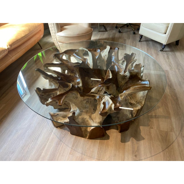 This is not an ordinary driftwood base table, it is made from a huge round teak wood root that looks just so fabulous from...