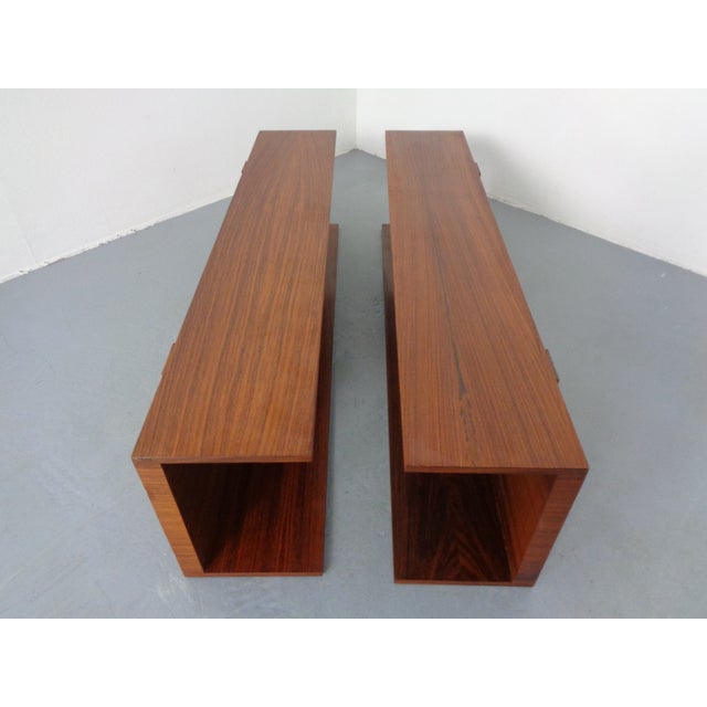 Rosewood wall shelf by Walter Wirz for Wilhelm Renz from the 1960s. Another shelf is available. This piece has an...