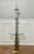 Fabulous vintage brass floor lamp with glass table by Stiffel, circa 1970's. The lamp features two lights with pull chains...