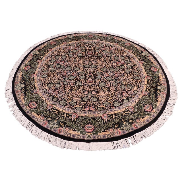 This hand‑knotted Pak Persian round rug showcases the finest expression of traditional Persian artistry. Each piece is...
