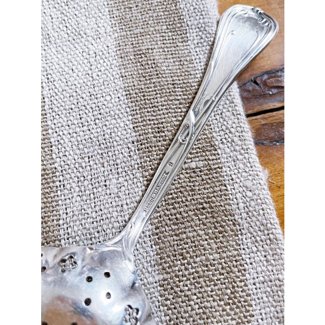 A beautiful antique silver plated powdered sugar sifter, perfect for serving olives and pickles or anything briney, or...