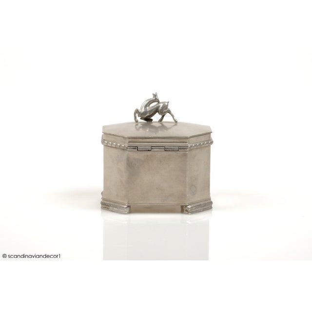 Handmade Swedish Grace tobacco jar made from pewter, by the Swedish designer Harald Linder for Uddevalla, 1920s. A...