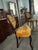 Vintage Victorian Style Accent Chair. Dark Wood Frame (possibly Mahogany). Gold colored Velvet Tufted upholstery with...