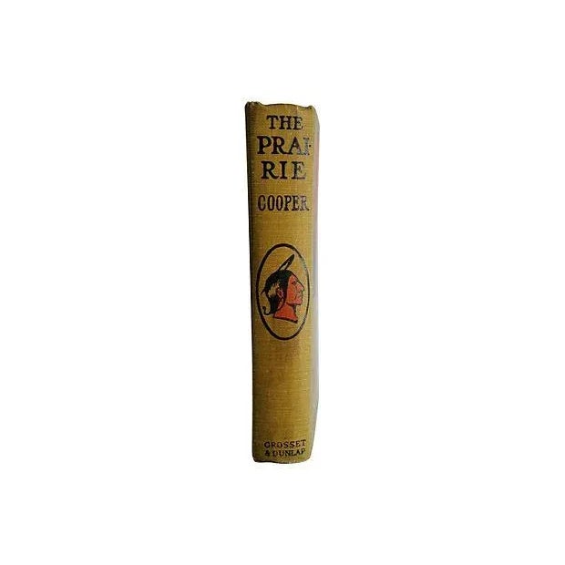 The Prairie by J. Fenimore Cooper. New York: Grosset & Dunlap, circa 1920. Hardcover. 430 pages. Loose binding, worn pages...