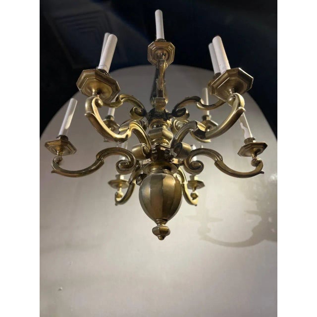 A circa 1920’s Dutch 12 lights chandelier with original finish