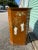 Beautiful Carmel color Asian style cabinet with shelves inside. Tall enough to be a pedestal or small console table....