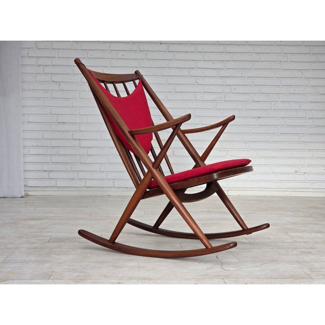 1960s Danish rocking chair by Frank Reenskaug, model 182. Reupholstered in high-quality, furniture wool upholstery fabric....