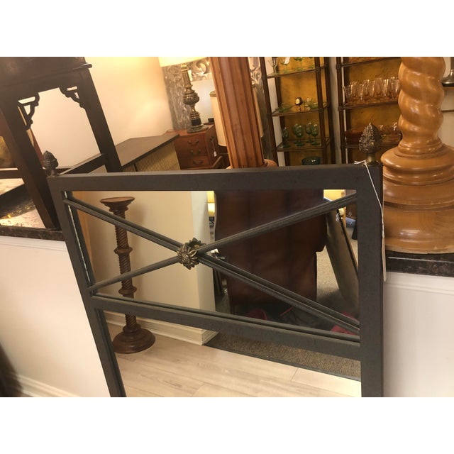 Simplicity is elegance. This metal rectangular mirror has a "greek key" design with a small rosette in the middle. Was...