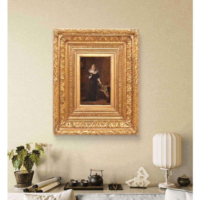 Beautiful portrait of a woman, an elegant lady reading an antique book, an oil painting on panel from the 19th century....