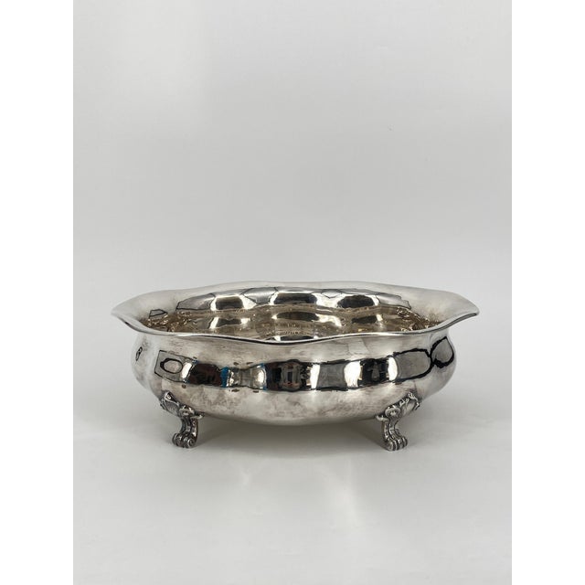 * exceptionally large bowl with four feet * made of 830 silver * 950 grams * made in Germany * Hallmark: Crescent Crown...