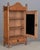 A French faux bamboo miniature armoire made of beech and pine with mirrored door and small drawer. Nicely detailed with...