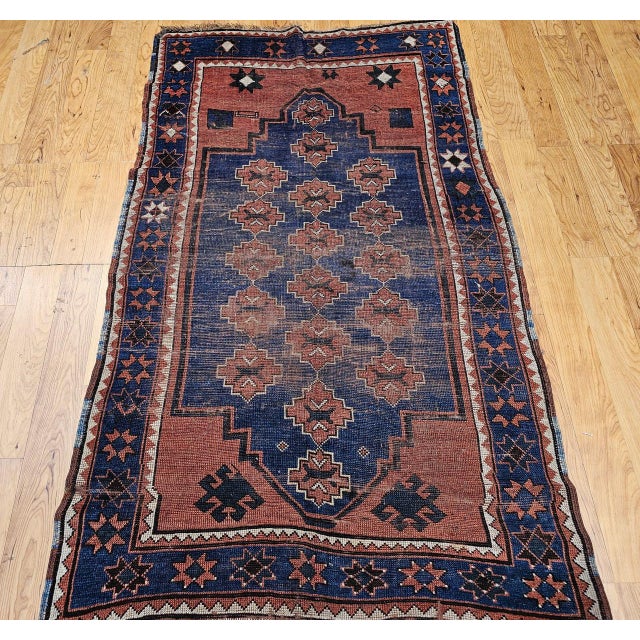 This antique Caucasian Kazak area rug from the village of Bordjalou in the south-central Caucasus, dating to the late 19th...