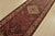 An authentic vintage tribal Hamedan runner hand-knotted with fine wool and natural dyes. This nomadic rug features a...