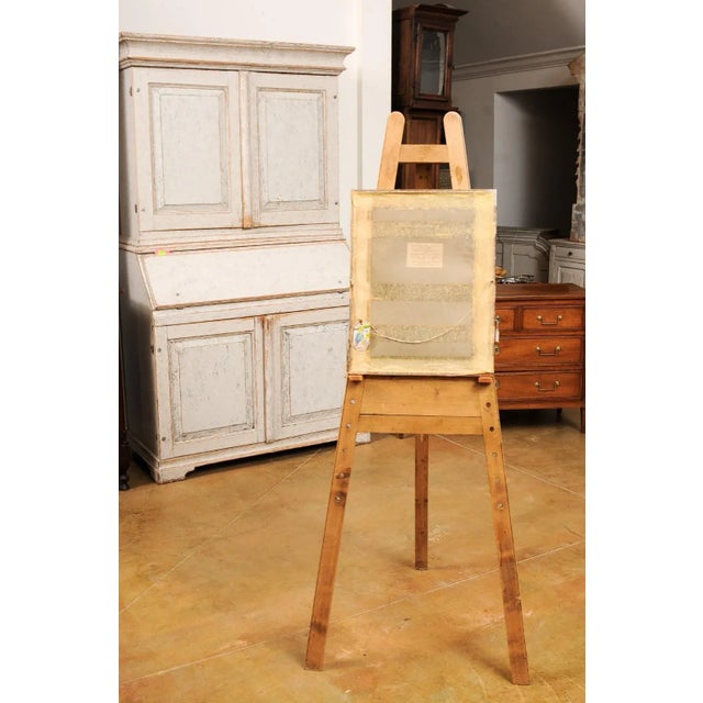 A French pastel still-life painting from the 19th century depicting a bouquet of tulips on grey background, in gilded...