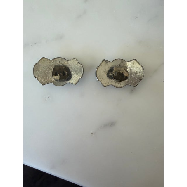 During the Art Deco period, convertible jewelry frameworks like the Duette mechanism became highly fashionable. Dual...