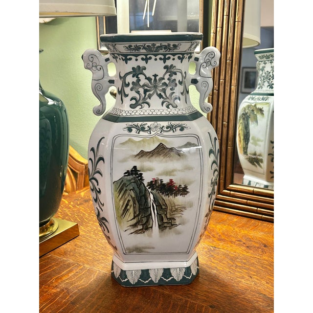 This vase is large and makes a statement. Vintage Andrea by Sadek, this porcelain vase features an elegant baluster form...