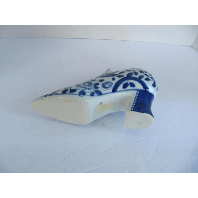 Vintage chinoiserie blue and white shoe. A whimsical piece to add to your collection. Combined shipping is available.