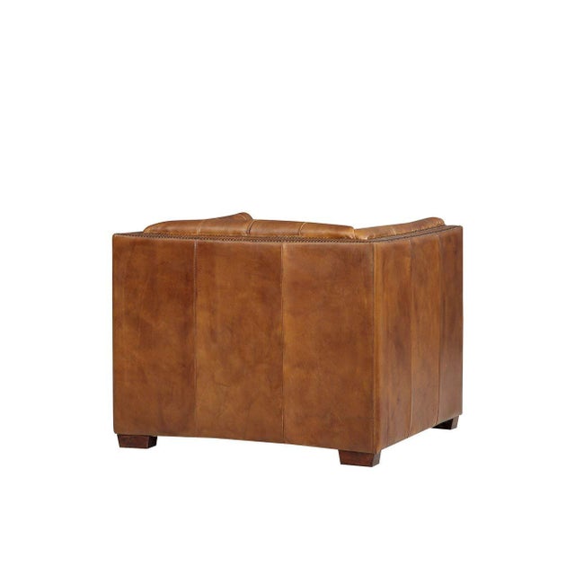 "The Tuxedo Leather Living Room Collection showcases timeless designs with high end materials and construction. Top Grain...