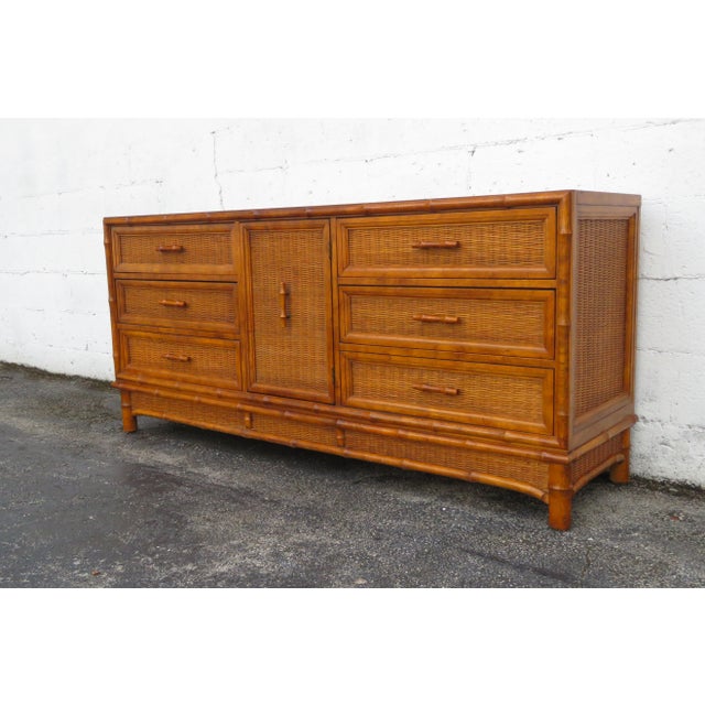 This magnificent Dresser is made of wood, solid wood, bamboo, wicker, and veneer. The Dresser was made by American of...