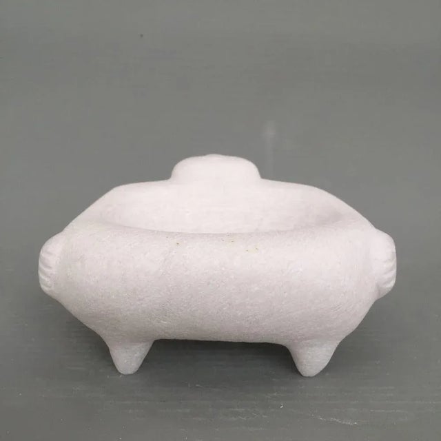 Lying figure hand carved marble sculpture by tom von kaenel dimensions: d18 x w16 x h8.5 cm materials: marble this piece...