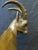 This vintage early 20th century work of art depicts a well defined bronze animal sculpture signed by L. Miller, the...