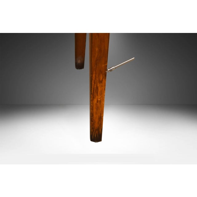 A beautiful, mid-century modern, 1960’s, Danish style, made of rich walnut, simple lines, with elongated floating style...