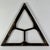 A unique and now decorative architectural salvage window frame. It's equilateral triangle design with it's 3 honeycomb...
