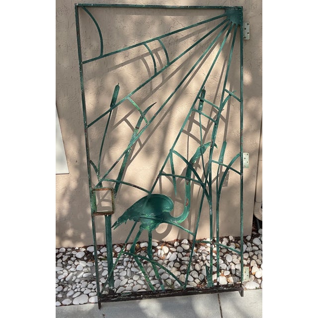 Exceptional iron door /gate with artistic metalwork , beautiful handcrafted copper flamingo bird mounted in the center ....