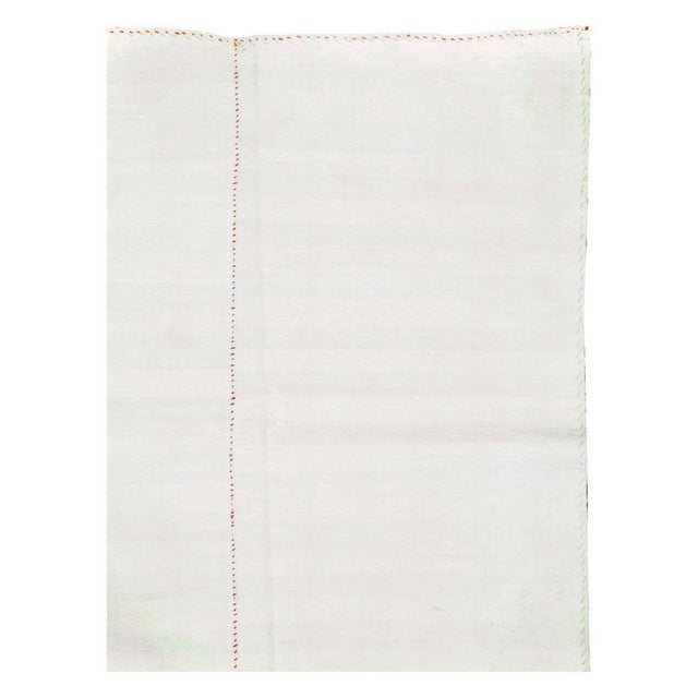 A vintage Turkish flatweave Kilim accent rug handmade during the mid-20th century. Measures: 5' 3" x 8' 8".