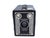 This Eastman Kodak Brownie Target Six-20 is a striking example of mid-century industrial design, featuring a bold Art Deco...