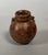 Quimbaya culture, Colombia, Central Cauca Valley. Circa 500-1500 AD. Jar-shaped vase in the form of a seated...
