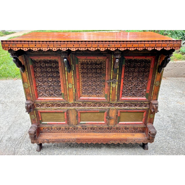 This antique Indian dowry wedding chest from the 1800s is abundant in eye-catching details, from hand-wrought metal...