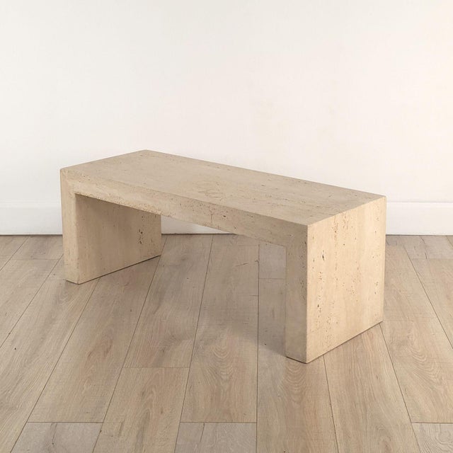 A Michael Taylor waterfall travertine coffee table, U.S.A. circa 1980. From a San Francisco home where it was installed by...